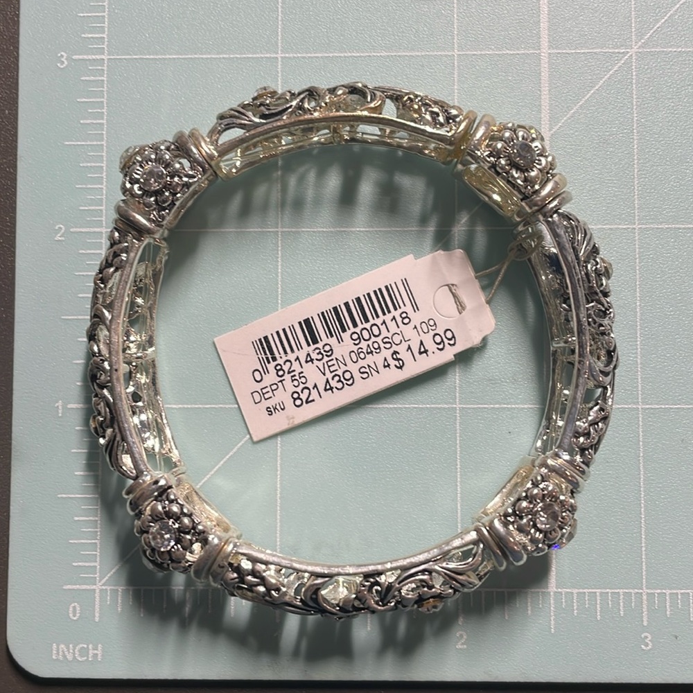 Bracelet dress barn new in package With small cinch gift bag seen in photo.